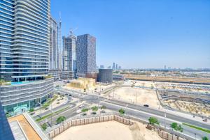 an aerial view of a city with tall buildings at Primestay - Sophisticated & Classy New Fully Furnished 2 Bedroom in Downtown in Dubai