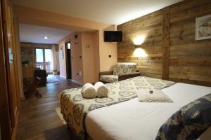 Postel nebo postele na pokoji v ubytování Hotel Granta Parey