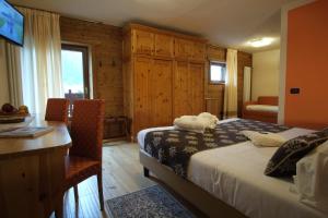 Postel nebo postele na pokoji v ubytování Hotel Granta Parey
