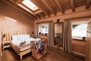 Ένα ή περισσότερα κρεβάτια σε δωμάτιο στο Agriturismo Milord
