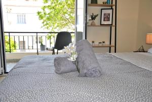 A bed or beds in a room at Houseloft Volos Vista