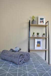 A bed or beds in a room at Houseloft Volos Vista