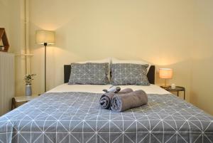A bed or beds in a room at Houseloft Volos Vista