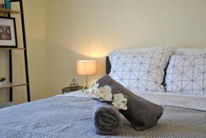 A bed or beds in a room at Houseloft Volos Vista