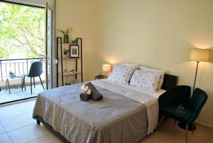 A bed or beds in a room at Houseloft Volos Vista