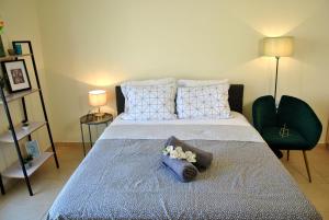 A bed or beds in a room at Houseloft Volos Vista