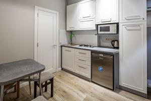 Virtuvė arba virtuvėlė apgyvendinimo įstaigoje Rynok Square Apartments