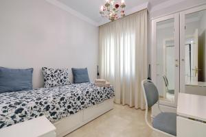 Banana Beach primera línea de playa客房内的一张或多张床位