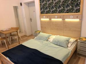 מיטה או מיטות בחדר ב-Hostel Kubik