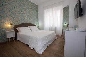 Posteľ alebo postele v izbe v ubytovaní Comfy Vatican Suite