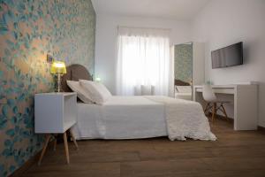 Posteľ alebo postele v izbe v ubytovaní Comfy Vatican Suite