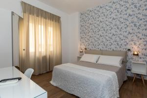 Posteľ alebo postele v izbe v ubytovaní Comfy Vatican Suite