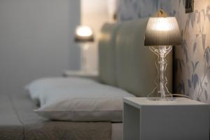 Posteľ alebo postele v izbe v ubytovaní Comfy Vatican Suite