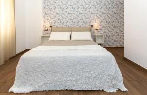 Posteľ alebo postele v izbe v ubytovaní Comfy Vatican Suite