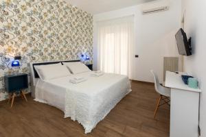 Posteľ alebo postele v izbe v ubytovaní Comfy Vatican Suite
