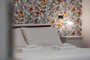 Posteľ alebo postele v izbe v ubytovaní Comfy Vatican Suite