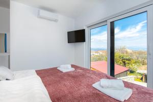 Posteľ alebo postele v izbe v ubytovaní Villa Gloriette + 37 fotografií