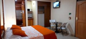 Katil atau katil-katil dalam bilik di Hoteles Bogotá Inn Turisticas 63