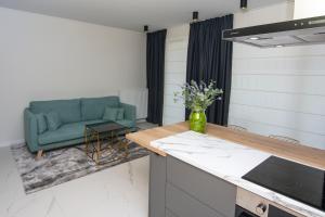 Kuchyňa alebo kuchynka v ubytovaní EL Apartments - Aries