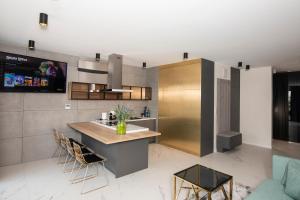Kuchyňa alebo kuchynka v ubytovaní EL Apartments - Aries