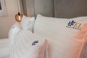Posteľ alebo postele v izbe v ubytovaní EL Apartments - Aries