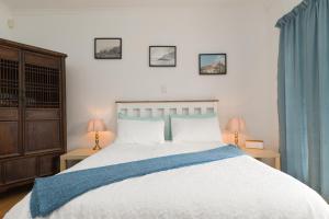 Ένα ή περισσότερα κρεβάτια σε δωμάτιο στο The Walmer Oasis +16 φωτογραφίες