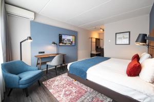 Postel nebo postele na pokoji v ubytování Hotel De Bilderberg