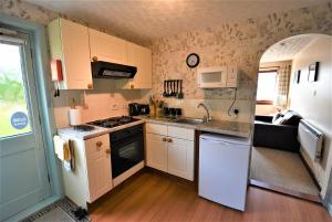 Η κουζίνα ή μικρή κουζίνα στο Balcarres Self Catering