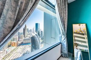 Nespecifikovaný výhled na destinaci Dubaj nebo výhled na město při pohledu z apartmánu