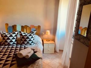 Posteľ alebo postele v izbe v ubytovaní Casa Batella