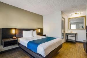 Säng eller sängar i ett rum på Motel 6-Hillsville, VA