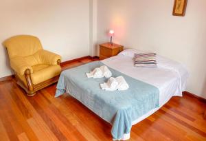 Postel nebo postele na pokoji v ubytování Canary Bio Hostel Tenerife