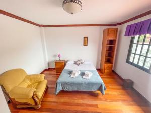 Postel nebo postele na pokoji v ubytování Canary Bio Hostel Tenerife