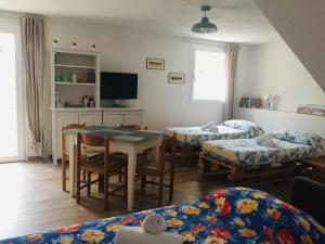 Postel nebo postele na pokoji v ubytování B&B I Falchi Pellegrini