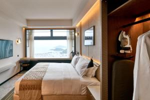 A bed or beds in a room at the Arca