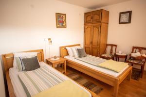 Postel nebo postele na pokoji v ubytování Kuća za odmor Vallirea