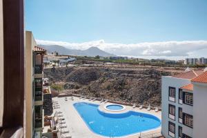 a view of a swimming pool from a building at Apartamento Callao Salvaje in Callao Salvaje