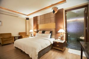 Voodi või voodid majutusasutuse Dongfeng Motel toas