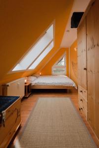 Ένα ή περισσότερα κρεβάτια σε δωμάτιο στο Bernsteintraum