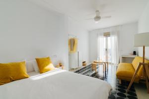 Postel nebo postele na pokoji v ubytování Punta Paradiso