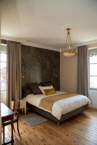 מיטה או מיטות בחדר ב-Castel serein