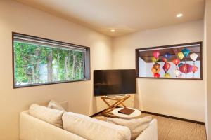 TV a/nebo společenská místnost v ubytování ADAN RESORT 灯 - Lamp -
