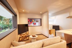 TV a/nebo společenská místnost v ubytování ADAN RESORT 灯 - Lamp -