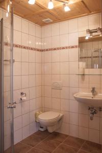 Ванна кімната в Ferienhaus Tuxerhof