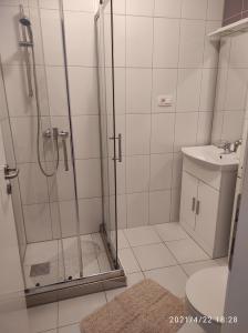 Kúpeľňa v ubytovaní Apartmani QUATTRO + 37 fotografií