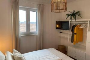 Postel nebo postele na pokoji v ubytování Villa Katarina - großer Pool beheizt - Meerblick
