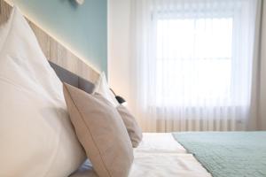 Postel nebo postele na pokoji v ubytování Hotel Lehn
