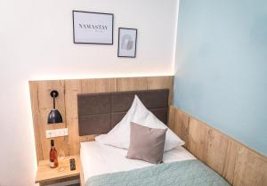 Postel nebo postele na pokoji v ubytování Hotel Lehn