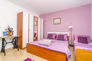 Postel nebo postele na pokoji v ubytování Apartment Bay of Dreams + 37 fotografií