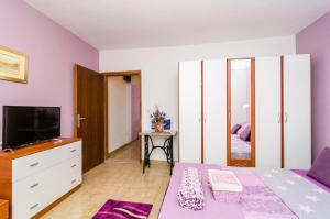 TV a/nebo společenská místnost v ubytování Apartment Bay of Dreams